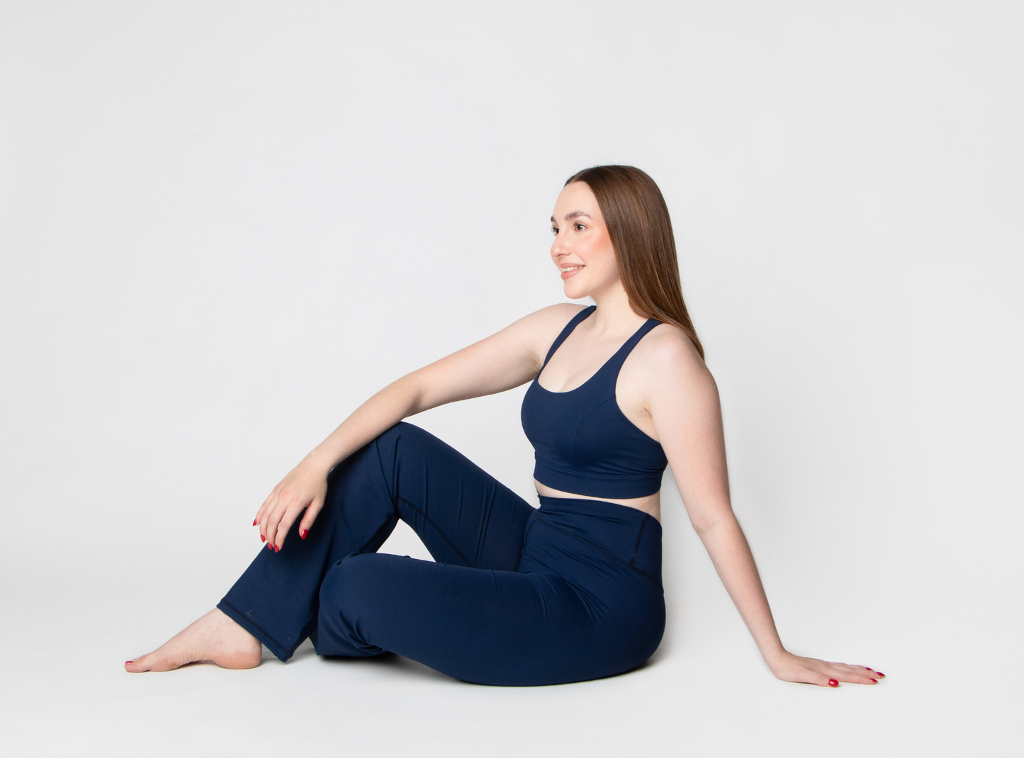 Legging flare con pretina cruzada