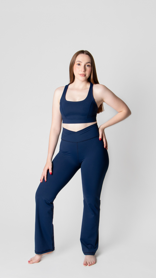 Legging flare con pretina cruzada