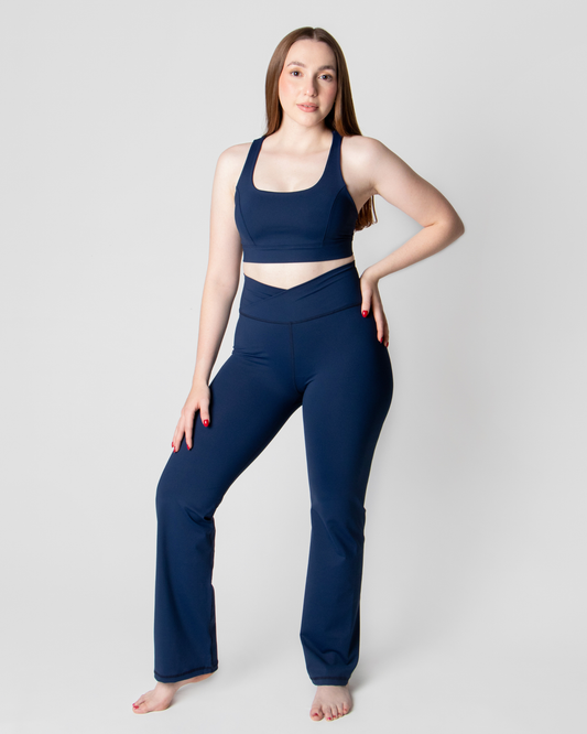 Legging flare con pretina cruzada